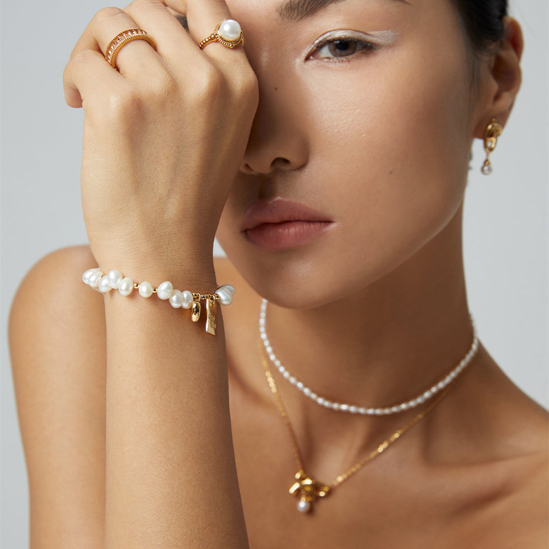 Freshwater Pearl Bracelet with Heart Charms