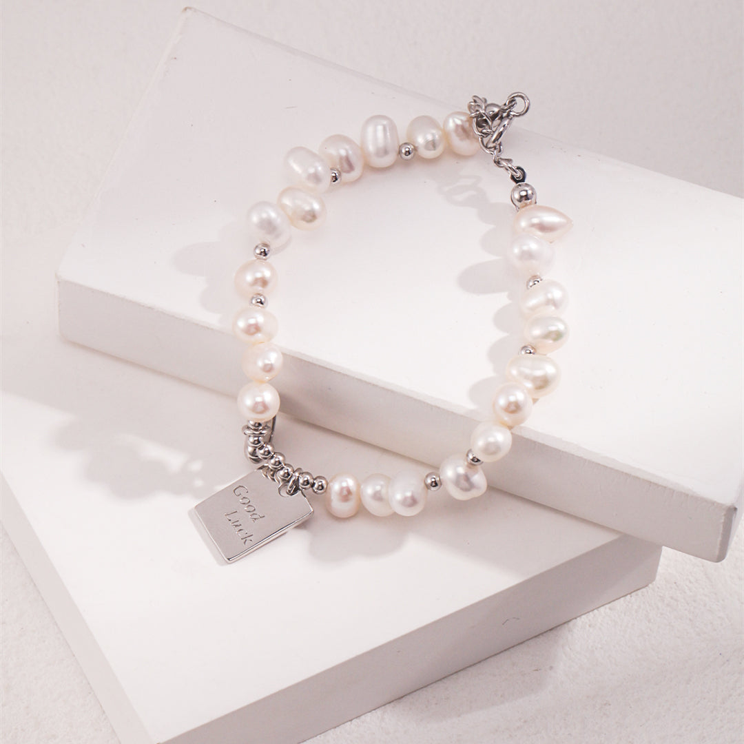 Freshwater Pearl Bracelet with Heart Charms